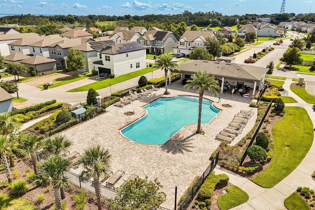 2163 White Feather Loop, Oakland, FL 34787 - community pool with a residential view and a patio area