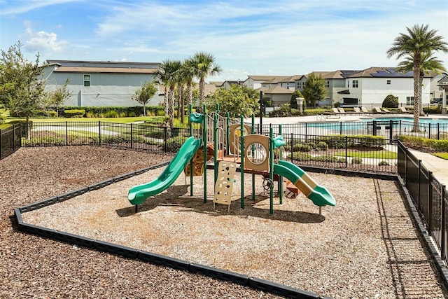 2163 White Feather Loop, Oakland, FL 34787 - community playground with a residential view and a community pool