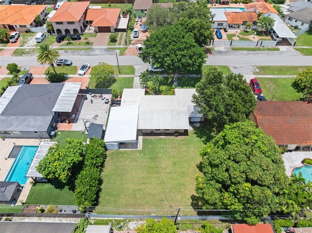 138 W 52nd St, Hialeah, FL 33012 - aerial perspective of suburban area featuring a pool