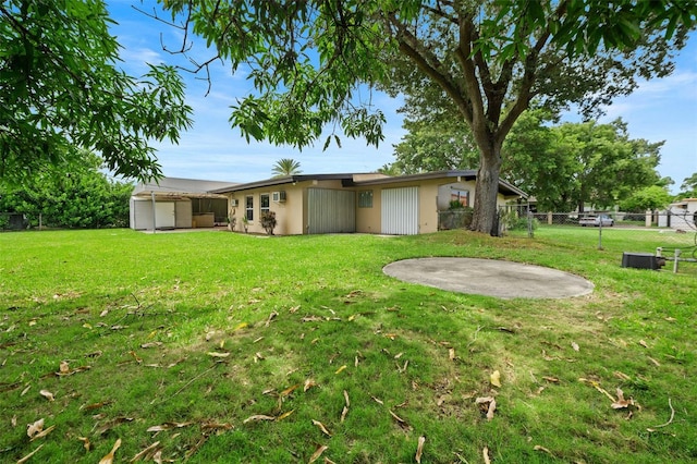 138 W 52nd St, Hialeah, FL 33012 - back of house featuring stucco siding