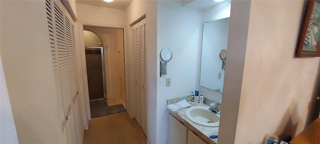 13420 Debbie Ln, Clermont, FL 34715 - bathroom with a closet and vanity