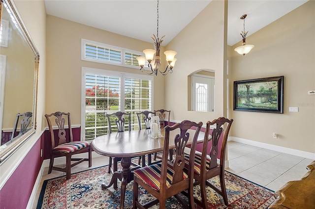 5349 Grove Mnr, Lady Lake, FL 32159 - dining room with high vaulted ceiling, tile patterned floors, a chandelier, and arched walkways