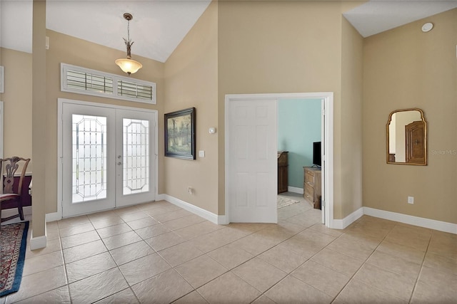 5349 Grove Mnr, Lady Lake, FL 32159 - foyer with high vaulted ceiling, light tile patterned floors, and french doors
