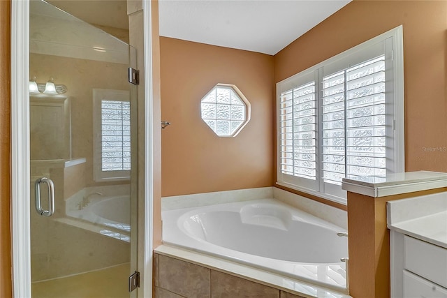 5349 Grove Mnr, Lady Lake, FL 32159 - bathroom featuring healthy amount of natural light, a bath, and vanity
