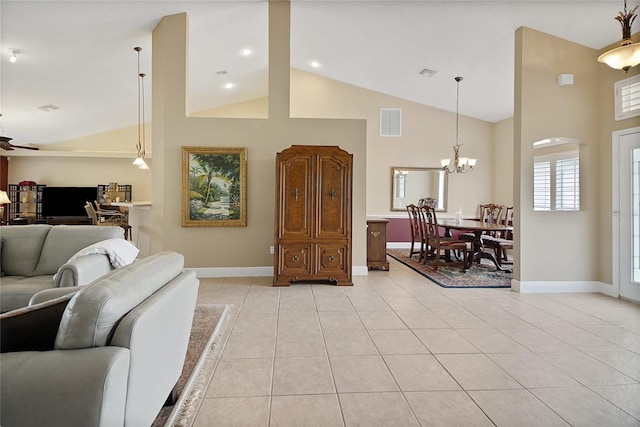 5349 Grove Mnr, Lady Lake, FL 32159 - living area with high vaulted ceiling, a chandelier, light tile patterned floors, and a ceiling fan