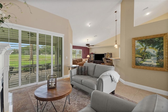 5349 Grove Mnr, Lady Lake, FL 32159 - tiled living room with lofted ceiling and a fireplace
