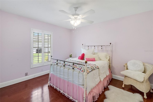5349 Grove Mnr, Lady Lake, FL 32159 - bedroom with dark wood finished floors and ceiling fan