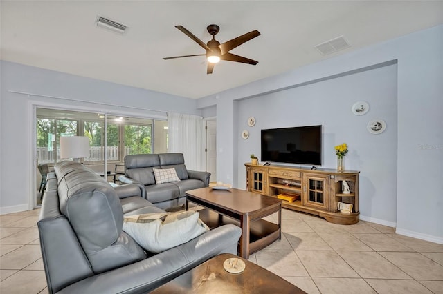 11816 SE 91st Cir, Summerfield, FL 34491 - living area with ceiling fan and light tile patterned floors
