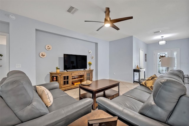 11816 SE 91st Cir, Summerfield, FL 34491 - living room with light tile patterned flooring and a ceiling fan