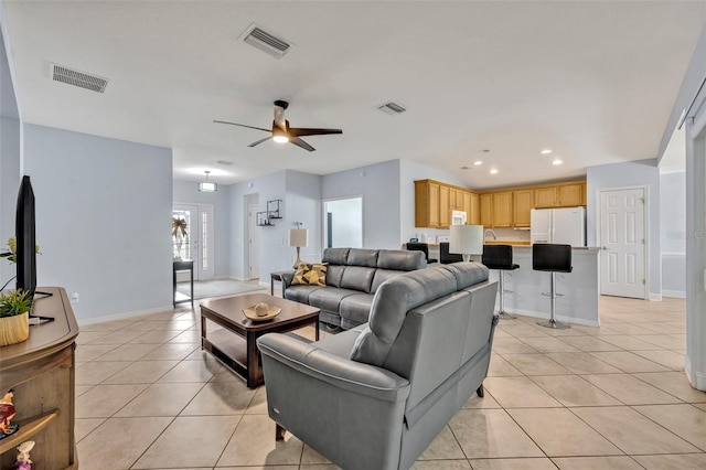 11816 SE 91st Cir, Summerfield, FL 34491 - living room with light tile patterned floors, a ceiling fan, and recessed lighting