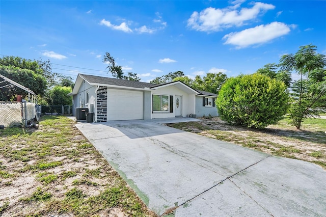 11326 Yellowwood Ln, Port Richey, FL 34668 - single story home featuring a garage, stucco siding, and concrete driveway
