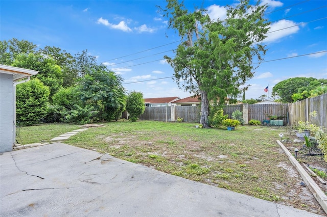 11326 Yellowwood Ln, Port Richey, FL 34668 - fenced backyard featuring a patio