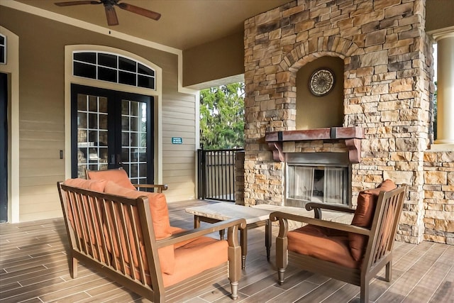 30300 Hackney Loop, Mount Dora, FL 32757 - deck featuring an outdoor stone fireplace, french doors, and ceiling fan