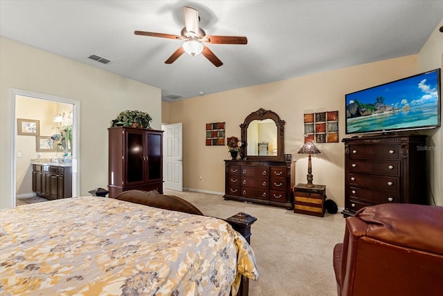 30300 Hackney Loop, Mount Dora, FL 32757 - bedroom with carpet flooring, a ceiling fan, and connected bathroom