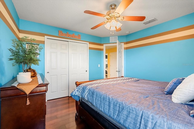 30300 Hackney Loop, Mount Dora, FL 32757 - bedroom featuring dark wood-style floors, a closet, and ceiling fan