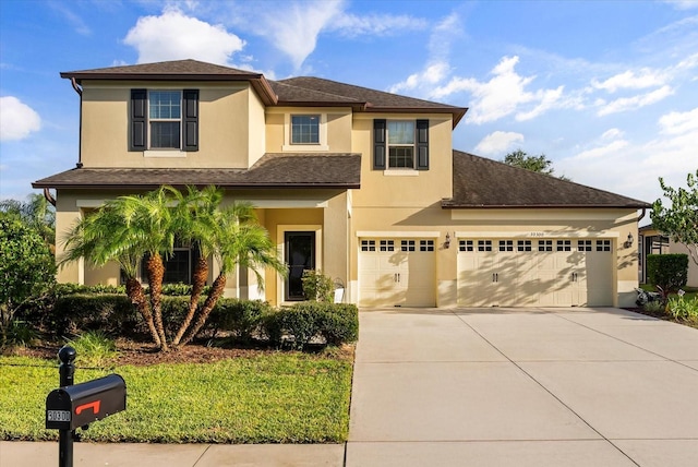 30300 Hackney Loop, Mount Dora, FL 32757 - view of front of property with concrete driveway, stucco siding, a garage, and a shingled roof