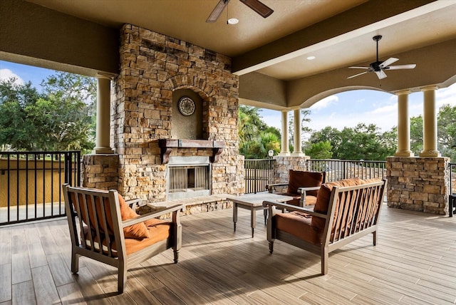30300 Hackney Loop, Mount Dora, FL 32757 - deck with a ceiling fan and an outdoor living space with a fireplace