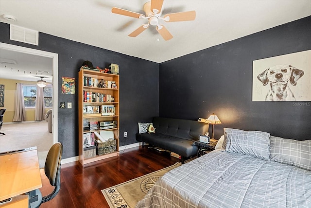30300 Hackney Loop, Mount Dora, FL 32757 - bedroom featuring wood finished floors, a desk, and ceiling fan