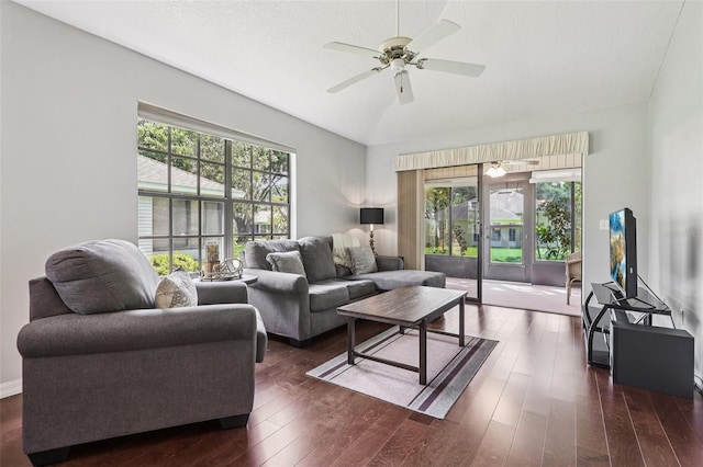 324 Juniper Way, Tavares, FL 32778 - living area featuring plenty of natural light, dark wood finished floors, and a ceiling fan