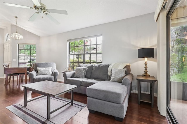 324 Juniper Way, Tavares, FL 32778 - living room with plenty of natural light, wood finished floors, vaulted ceiling, and a ceiling fan