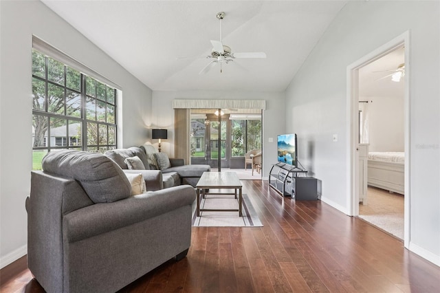 324 Juniper Way, Tavares, FL 32778 - living room with ceiling fan, vaulted ceiling, plenty of natural light, and dark wood-type flooring