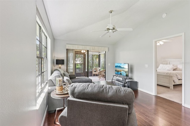 324 Juniper Way, Tavares, FL 32778 - living area featuring a ceiling fan, plenty of natural light, dark wood-type flooring, and high vaulted ceiling