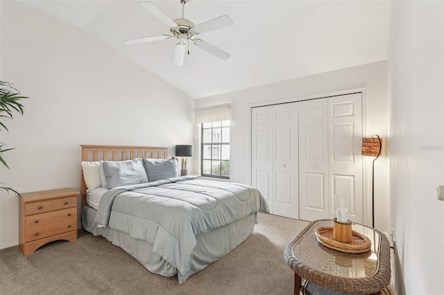 324 Juniper Way, Tavares, FL 32778 - bedroom featuring light carpet, lofted ceiling, a closet, and a ceiling fan