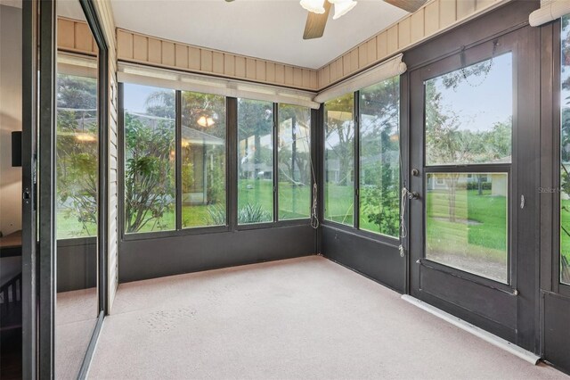 324 Juniper Way, Tavares, FL 32778 - unfurnished sunroom with a ceiling fan and healthy amount of natural light
