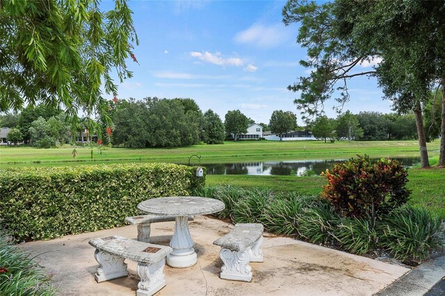 324 Juniper Way, Tavares, FL 32778 - view of patio with a water view
