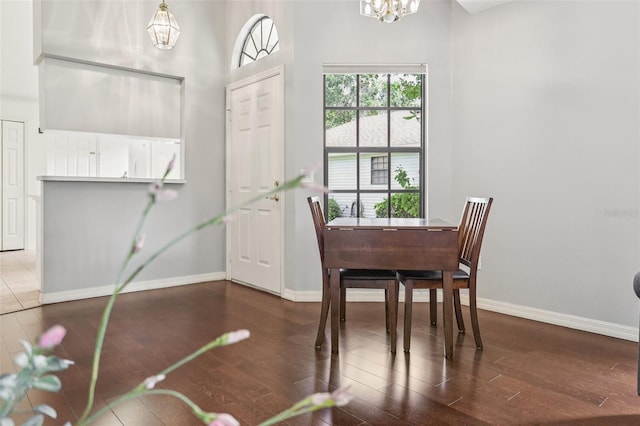 324 Juniper Way, Tavares, FL 32778 - dining area featuring a chandelier and wood finished floors