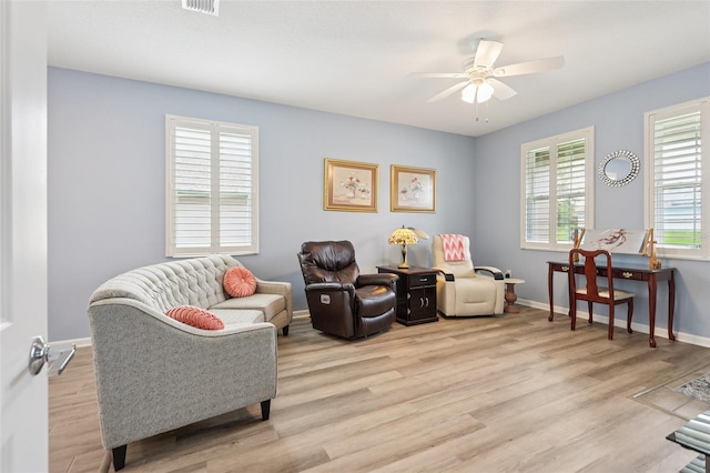 49 White Horse Way, Groveland, FL 34736 - sitting room with a ceiling fan and light wood finished floors