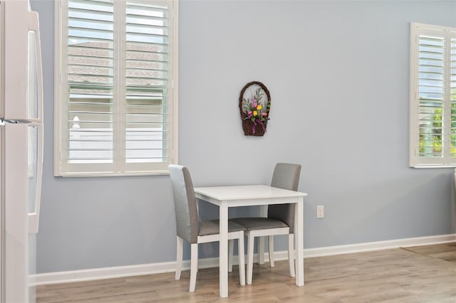 49 White Horse Way, Groveland, FL 34736 - dining room with wood finished floors and baseboards