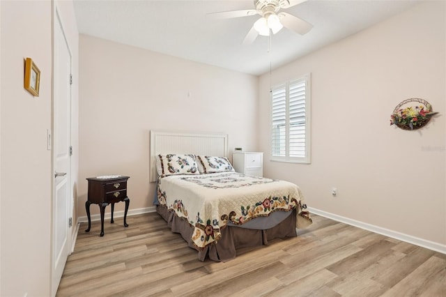 49 White Horse Way, Groveland, FL 34736 - bedroom with light wood-style floors and ceiling fan