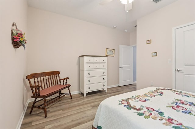 49 White Horse Way, Groveland, FL 34736 - bedroom with light wood-type flooring and a ceiling fan