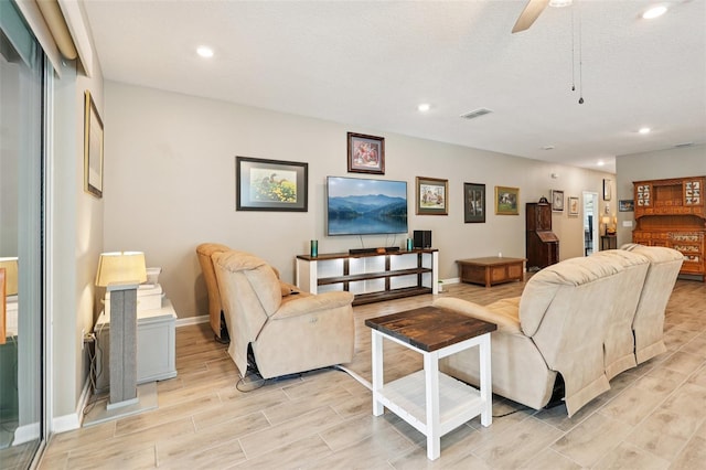49 White Horse Way, Groveland, FL 34736 - living room featuring wood tiled floors, a ceiling fan, and recessed lighting
