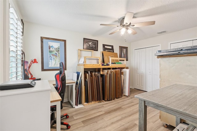 49 White Horse Way, Groveland, FL 34736 - office space featuring light wood-style floors, a ceiling fan, and a textured ceiling