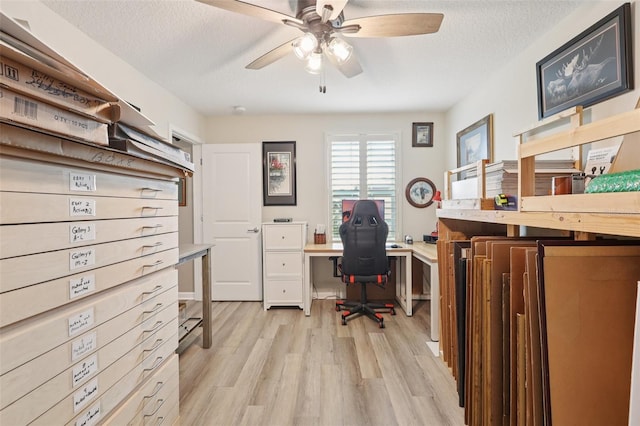 49 White Horse Way, Groveland, FL 34736 - office area with light wood finished floors, ceiling fan, and a textured ceiling