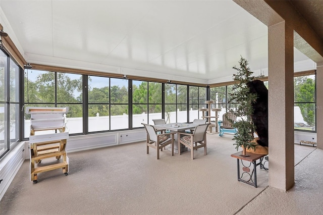 49 White Horse Way, Groveland, FL 34736 - sunroom featuring carpet floors, healthy amount of natural light, and outdoor dining area