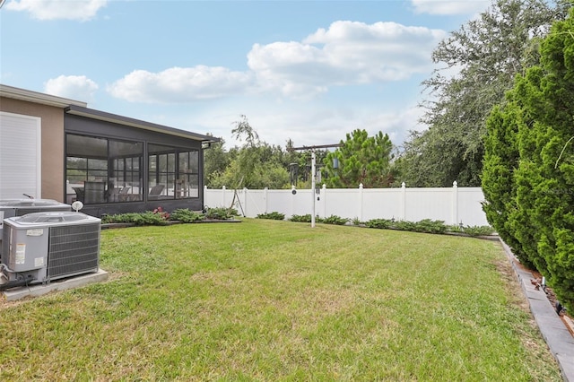 49 White Horse Way, Groveland, FL 34736 - fenced backyard with a sunroom