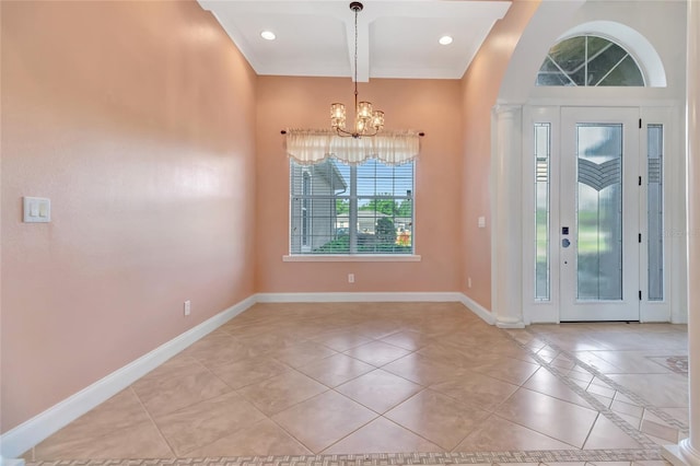 18139 Great Blue Heron Dr, Groveland, FL 34736 - entryway featuring a chandelier, light tile patterned floors, recessed lighting, ornate columns, and beamed ceiling