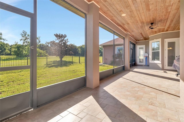 18139 Great Blue Heron Dr, Groveland, FL 34736 - unfurnished sunroom featuring ceiling fan