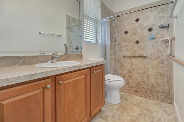 18139 Great Blue Heron Dr, Groveland, FL 34736 - bathroom with tiled shower, vanity, and tile patterned flooring