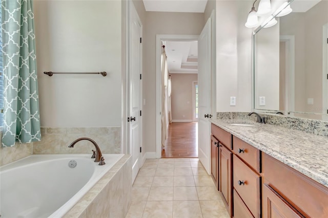 18139 Great Blue Heron Dr, Groveland, FL 34736 - full bath featuring vanity, a garden tub, and tile patterned floors