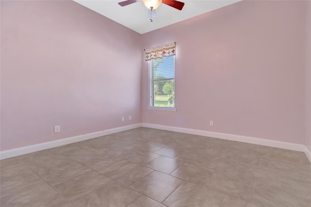 18139 Great Blue Heron Dr, Groveland, FL 34736 - tiled spare room with ceiling fan and baseboards