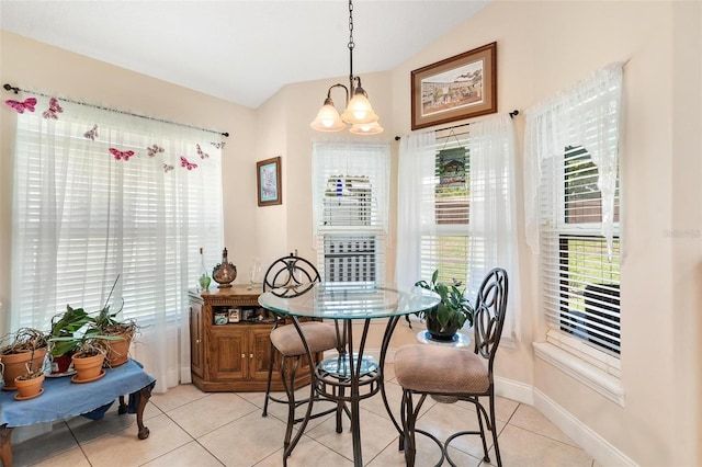 1412 Cove Pl, Tavares, FL 32778 - dining space with vaulted ceiling, light tile patterned flooring, and a chandelier