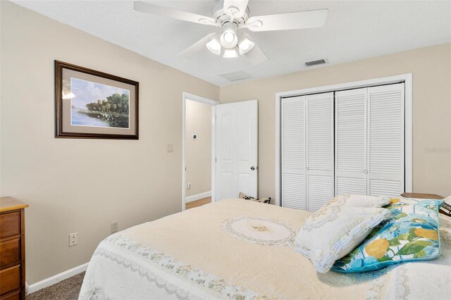 1412 Cove Pl, Tavares, FL 32778 - carpeted bedroom featuring a closet and ceiling fan
