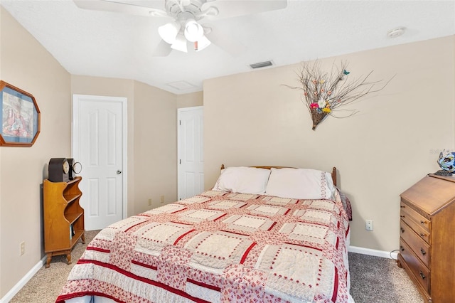 1412 Cove Pl, Tavares, FL 32778 - carpeted bedroom featuring baseboards and ceiling fan