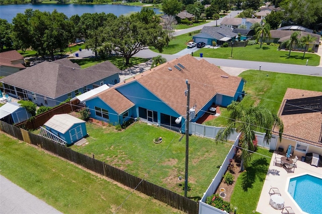 1412 Cove Pl, Tavares, FL 32778 - aerial perspective of suburban area with a pool area and a nearby body of water