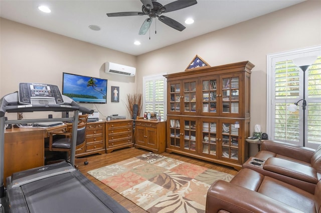 9015 Saint Andrews Way, Mount Dora, FL 32757 - home office with a wall mounted AC, light wood-style floors, plenty of natural light, ceiling fan, and recessed lighting