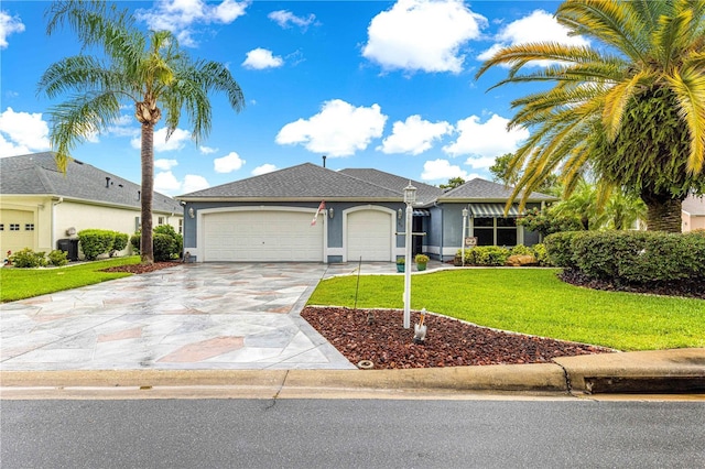 89 Palermo Pl, The Villages, FL 32159 - ranch-style house featuring driveway, a garage, a front yard, and stucco siding
